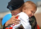 ArmyTroopsLeaveGaffney--FIN  Sgt. James Sparks, of Gaffney, holds his son David, 1, after a ceremony honoring troops from the 4th Battalion, 118th Infantry of the South Carolina National Guard in downtown Gaffney, SC Saturday morning, 5-29-04. The troops are being deployed to Kosovo.   (AP Photo/Spartanburg Herlald-Journal/Tim Kimzey)