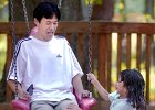 swinging2.jpg  After getting a swing from her dad, Hosana Nagasaka, 6, returns the favor to her father, Hitoshi, at Century Park in Greer Wednesday.