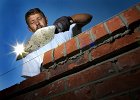 BrickLaying  Brian Blanton, of Gaffney, with Benton Masonry, lays a wall of brick Monday morning, August 12, 2002 in Spartanburg, SC. The work is part of an expansion project for the Piedmont Club in Spartanburg. (AP Photo/Spartanburg Herald-Journal/Tim Kimzey).