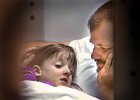 clairedad.jpg  Dennis Boan, right, talks with and reassures his daughter Claire, 6, as she is about to be taken into the operation room for a heart transplant at Carolinas Medical Center in Charlotte Monday night.