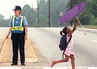 crossguard2.jpg  Joanne Halford makes sure children at Pine Street Elementary cross the road safely Tuesday in Spartanburg. Halford is retiring Thursday after 30 years of being a crosswalk guard.