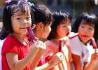 popsiclespark.jpg  Kaho Sekido, 4, left, and other children from the Japanese Saturday School of Greenville, enjoy popsicles while at Century Park in Greer Wednesday. Temperatures reached the 90&#39;s throughout the Upstate Wednesday.