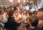 wafflehousewedding.jpg  Matt Cox, left, and his bride Debra Steadman Cox hug and kiss after they are pronounced man and wife in a wedding ceremony at the Hearon Circle Waffle House in Spartanburg Monday afternoon.  >>>SEE Susan Orr story.